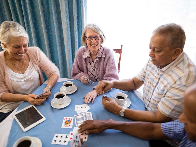 seniors playing cards